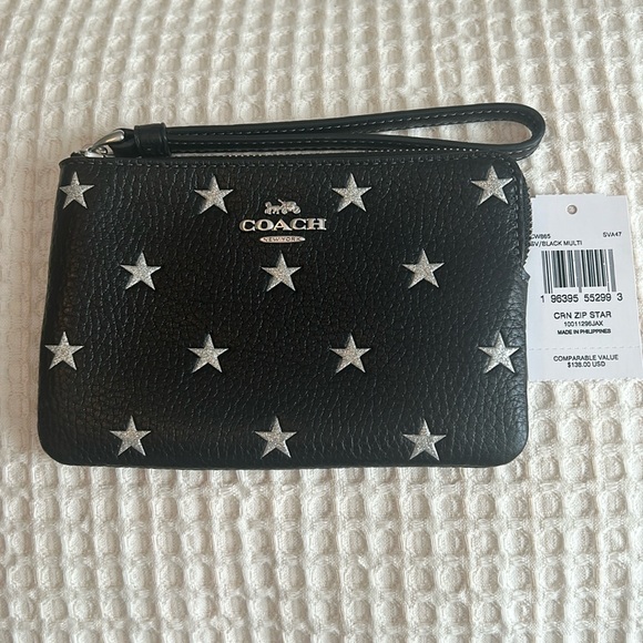 Coach Handbags - Coach star zip pouch.